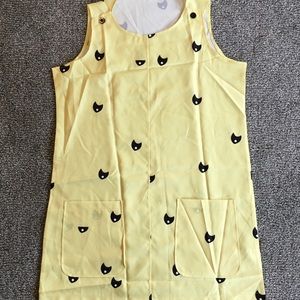 Yellow tank top with 2 front pockets